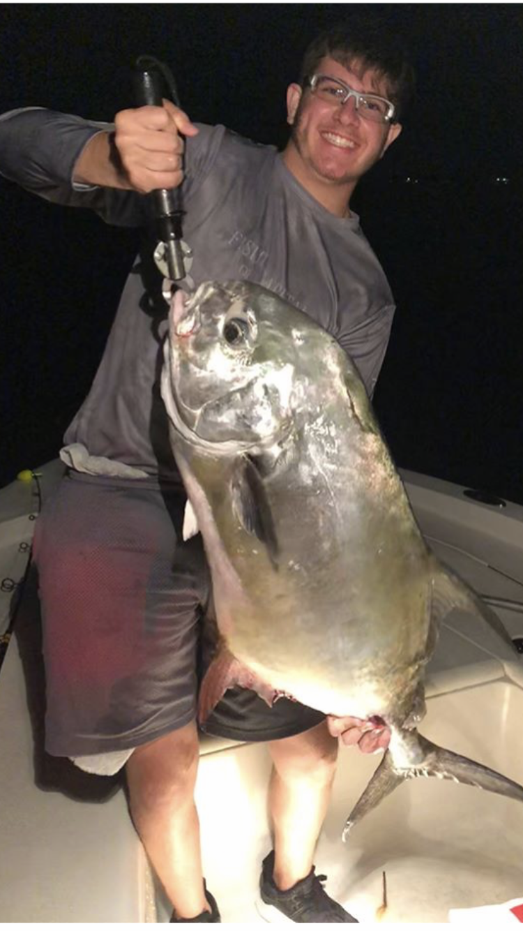 Man holding large permit