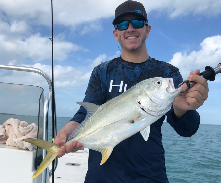 Man holding jack fish cropped